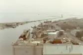 Panorama över hamninloppet, med Falkenbergs varv, Bröderna Wijklunds kolimport mm.