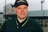 Åbytravet i Åby, Mölndal, under travloppet Olympiatravet, den 10 april 1999. Porträtt av en man.
