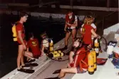 Medlemmar i Lindome Sportdykarklubb övar dykning i Åby simhall i Åby, Mölndal, år 1983.
