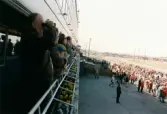 Publik på läktaren vid Åbytravet i Åby, Mölndal, under travloppet Drottning Silvias Pokal, söndagen den 3 maj 1997.