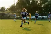 Fotbollslaget Jitex BK spelar match mot Öxabäcks IF på Kvarnbyvallen i Mölndal, maj 1990. Jitex BK vann matchen med 3-1.