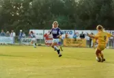 Fotbollslaget Jitex BK spelar match mot Öxabäcks IF på Kvarnbyvallen i Mölndal, maj 1990. Jitex BK vann matchen med 3-1.