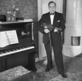 Fotografen Alf Blocking med fiolen