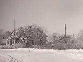 Snöbild. Villa vid Fastarpsvägen i Tvååker.