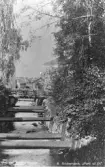 Söderhamnsån uppströms Tullgatsbron. Foto omkring 1920.