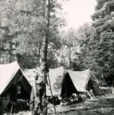 Resa till Fredrikstad i Norge med scouterna i augusti 1966. Porträtt av en scout vid lägret.