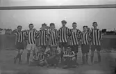 Fotbollslag med randiga tröjor, 1920-tal