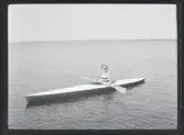 Kvinna i kajak.
