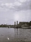 Stockholms hamn med bl a ett rotorfartyg, som med sina skorstenar ligger förtöjd, Stockholm 1927.