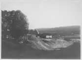 Dammen byggs 1897- Vy över dammbygget.