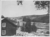 Dammen byggs 1897- Vy över Dalälven och bygget