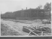 Kvarnsvedens pappersbruk, C 6409  21-7-1930. Vy över bygget.