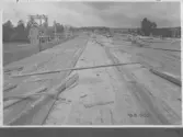 Kvarnsvedens pappersbruk, C 6429  18-8-1930. Vy över bygget. Golvet/taket färdig gjutet.