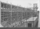 Kvarnsvedens pappersbruk, C 6436  18-8-1930. Vy över bygget.