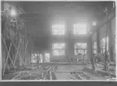 Kvarnsvedens pappersbruk, C 6509.  6-10-1930. Vy invändigt över bygget.