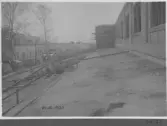 Kvarnsvedens pappersbruk, C 6523.  20-10-1930. Vy över nybygget och äldre byggnader.
