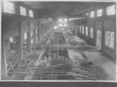 Kvarnsvedens pappersbruk, C 6535.  27-10-1930. Vy invändigt över bygget.
