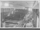 Kvarnsvedens pappersbruk, C 6605.  9-3-1931. Interiör bruket, Montering av pappersmaskin, PM8