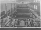 Kvarnsvedens pappersbruk, C 6614. 7-4-1931. Interiör bruket, Montering av pappersmaskin, PM8