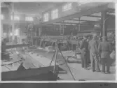 Kvarnsvedens pappersbruk, C 6616. 20-4-1931. Interiör bruket, Montering av pappersmaskin, PM8