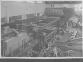 Kvarnsvedens pappersbruk, C 6617. 20-4-1931. Interiör bruket, Montering av pappersmaskin, PM8