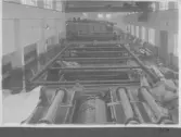 Kvarnsvedens pappersbruk, C 6618. 20-4-1931. Interiör bruket, Montering av pappersmaskin, PM8