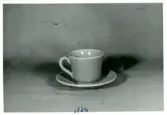 Te-/kaffekopp med fat från Bo Fajans, omkring 1900-talets mitt.