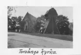 Torsångs kyrka och klockstapel.