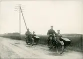 Motorcykel med sidovagn på väg, Uppsala