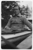 Rökande man i kajak, 1930-tal