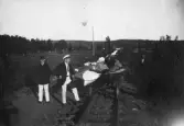 Kajaker på tralla från Åsbro station till Tisaren, Åsbro, 1921