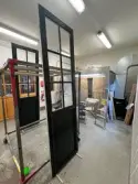 Renovering av dörrar på Heinemanns snickeri, Norrala.