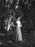 Kvinna i grönska