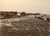 Parti af Vintjärn med stationshuset till vänster (enligt text i album).