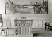 Hvitfeldtsskolan (Hvitfeldtska) uppfördes åren 1915-1919 och arkitekt var Ernst Torulf.
Hvitfeldtsskolans aula med podiet och i fonden konstnären Carl Wilhelmssons målning 