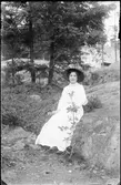 Kvinna