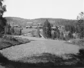 Bjursås, Falun. Från Skarpsveden. Mårtsbo närmast.