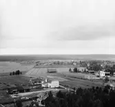 Avesta stad. Villervalla. Utsikt över järnverksbostäder.

