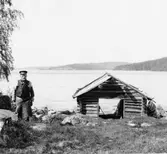 Bjursås, Falun. Sjön Rällsjön, Mittjils Erik och båthus.

