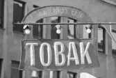 Telegrafen 17.  Butiksskylt.