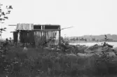 Leksand. Sundsnäs. Nothus och vägbanken.

