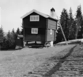 Leksand. Härbre, omgjort till bostadshus, vid Vår Herres gattu, Tällberg.

