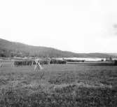 Leksand. Dimmbron (t.v.) och Insjön Horsberget i bakgrunden.

