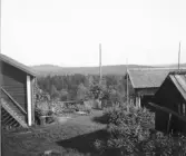 Leksand. Backen. Djurmoklack i bakgrunden.

