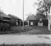Kyrkbyn. Grytnäs. Kaplagården, manbyggnad, mitten t.v. lada.

