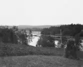 Gagnef. Älven. Flottbron över öster Dalälven ovan sammanflödet.

