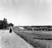 Mora. Kråkberg. Lilla Noret i mitten. Mora kyrktorn i bakgrunden.

