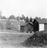 Hedemora. Garpenberg. Finnhyttan. Bod vid Sjöbergs. Kyrkomuren och sockenstugan. 1929-1930.