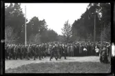 Förbimarsch av f.d. knektar.