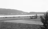 Malung. Utsjö, östra, älven från Backgården.

